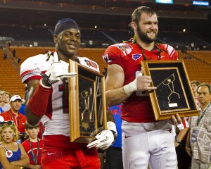 Dec 24, 2012; Southern Methodist defender Margus Hunt (92) holds his MVP trophies at the end of the Hawaii Bowl at Aloha Stadium. Credit: Marco Garcia-USA TODAY Sports