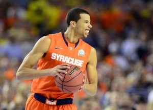 Syracuse Orange guard Michael Carter-Williams (1) reacts in the first half of the semifinals during the 2013 NCAA mens Final Four against the Michigan Wolverines at the Georgia Dome. Mandatory Credit: Bob Donnan-USA TODAY Sports