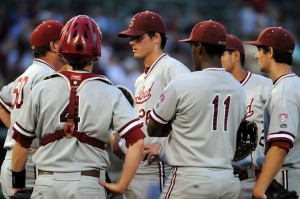 Stanford Cardinal pitcher Mark Appel (26) is met at the mound by teammates during the fourth inning of game one of the Tallahassee super regional against the Florida State Seminoles at Dick Howser Stadium. Mandatory Credit: Melina Vastola-USA TODAY Sports