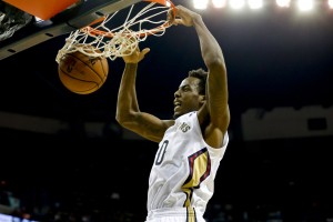 New Orleans Pelicans small forward Al-Farouq Aminu (0) dunks against the Charlotte Bobcats during the first quarter of a game at New Orleans Arena. Mandatory Credit: Derick E. Hingle-USA TODAY Sports