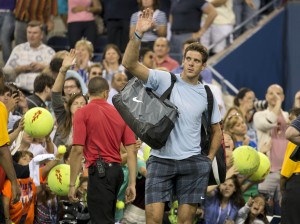 Juan Martin Del Potro (ARG) leaves the court after being defeated by Lleyton Hewitt (AUS) (not pictured) on day five of the 2013 US Open at the Billie Jean King National Tennis Center. Mandatory Credit: Susan Mullane-USA TODAY Sports
