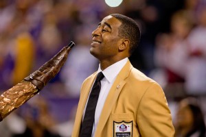 Hall of Fame wide receiver Cris Carter smiles during a moment honoring him before the game between the Washington Redskins and the Minnesota Vikings at Mall of America Field at H.H.H. Metrodome. The Vikings win 34-27. Mandatory Credit: Bruce Kluckhohn-USA TODAY Sports