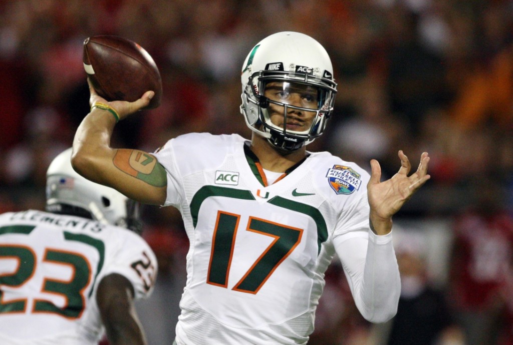 Miami Hurricanes quarterback Stephen Morris (17) throws a pass during the second quarter of the Russell Athletic Bowl against the Louisville Cardinals at Florida Citrus Bowl Stadium. Mandatory Credit: Rob Foldy-USA TODAY Sports