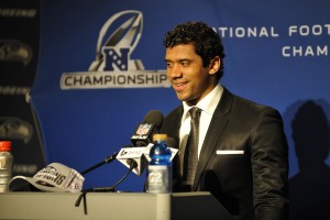 Seattle Seahawks quarterback Russell Wilson (3) addresses the media after the 2013 NFC Championship football game against the San Francisco 49ers at CenturyLink Field. Mandatory Credit: Steven Bisig-USA TODAY Sports