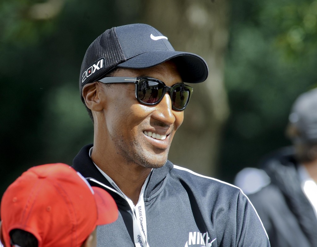 Chicago Bulls former player Scottie Pippen looks on as Tiger Woods (not pictured) tees off on the 10th hole during the final round of the BMW Championship at Conway Farms Golf Club. Mandatory Credit: Matt Marton-USA TODAY Sports