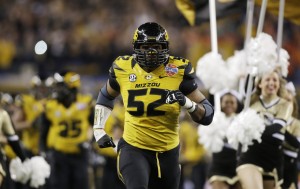 Missouri Tigers defensive lineman Michael Sam (52) runs on the field before the game against the Oklahoma State Cowboys at the 2014 Cotton Bowl at AT&T Stadium. Missouri beat Oklahoma State 41-31. Mandatory Credit: Tim Heitman-USA TODAY Sports