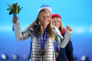 Jamie Anderson (USA) reacts after receiving her gold medal in the medal ceremony for the ladies' snowboard slopestyle during the Sochi 2014 Olympic Winter Games at Medals Plaza. Mandatory Credit: Kevin Liles-USA TODAY Sports