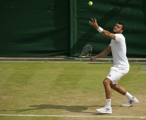  Jo-Wilfried Tsonga (FRA) in action during his match against Sam Querrey (USA) on day three of the 2014 Wimbledon Championships at the All England Lawn and Tennis Club. Mandatory Credit: Susan Mullane-USA TODAY Sports