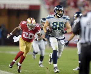 Seattle Seahawks tight end Tony Moeaki (88) is defended by San Francisco 49ers cornerback Perrish Cox (20) on a 63-yard reception in the second quarter of the Thanksgiving game at Levi's Stadium. Mandatory Credit: Kirby Lee-USA TODAY Sports