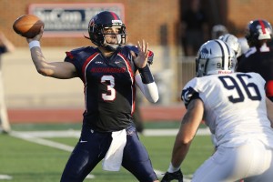 Richmond Spiders quarterback Michael Strauss (3) throws the ball as New Hampshire Wildcats defensive end Cody Muller (96) chases in the fourth quarter at Robins Stadium. The Wildcats won 29-26. Mandatory Credit: Geoff Burke-USA TODAY Sports