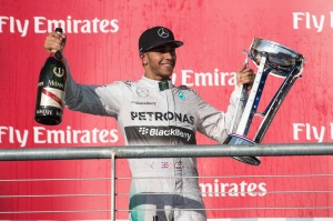 Mercedes driver Lewis Hamilton (44) of Great Britain celebrates winning the 2014 U.S. Grand Prix at Circuit of the Americas. Mandatory Credit: Jerome Miron-USA TODAY Sports