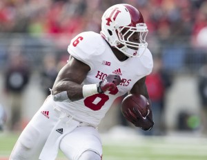 Indiana Hoosiers running back Tevin Coleman (6) carries the ball against the Ohio State Buckeyes at Ohio Stadium. Ohio State won the game 42-27. Mandatory Credit: Greg Bartram-USA TODAY Sports