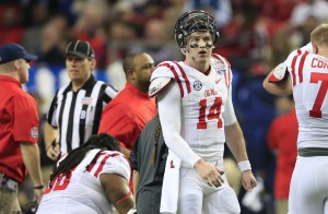 Mississippi Rebels quarterback Bo Wallace (14) reacts during the second quarter against the TCU Horned Frogs in the 2014 Peach Bowl at the Georgia Dome. Mandatory Credit: Paul Abell/CFA Peach Bowl via USA TODAY Sports