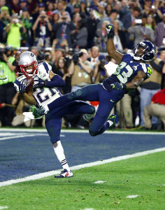 Feb 1, 2015; Glendale, AZ, USA; New England Patriots strong safety Malcolm Butler (21) intercepts a pass intended for Seattle Seahawks wide receiver Ricardo Lockette (83) in the fourth quarter in Super Bowl XLIX at University of Phoenix Stadium. Mandatory Credit: Mark J. Rebilas-USA TODAY Sports