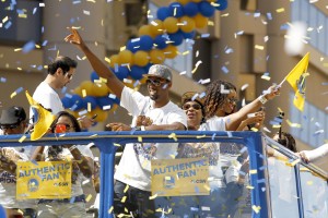 Golden State Warriors forward Harrison Barnes acknowledges the crowd during the Golden State Warriors 2015 championship celebration in downtown Oakland. Mandatory Credit: Cary Edmondson-USA TODAY Sports