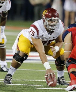 Injured USC center, Max Tuerk, signed with Athletes First for the 2016 NFL Draft. Photo via ocregister.com.