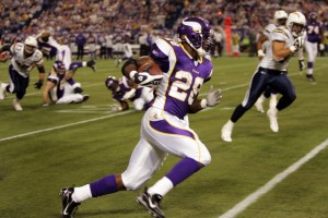 MINNEAPOLIS - NOVEMBER 4:  Adrian Peterson of the Minnesota Vikings runs for a 1st down in the 1st qtr against the San Diego Chargers on November 4, 2007, at the Metrodome in Minneapolis, Minnesota.  Minnesota won 35-17. (Photo by K.C. Alfred/Union-Tribune via Getty Images) *** LOCAL CAPTION ***