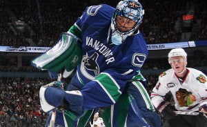 Vancouver Canucks goaltender Roberto Luongo (1) makes a save against a shot by the San Jose Sharks during the second period of game two of the first round of the 2013 Stanley Cup playoffs at Rogers Arena. Mandatory Credit: Anne-Marie Sorvin-USA TODAY Sports