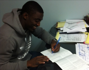 USF cornerback Kayvon Webster signing his Standard Representation Agreement with MAC.