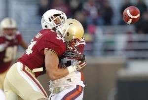 Nov 17, 2012; Boston College Eagles line backer Nick Clancy (54) hits Virginia Tech Hokies running back Tony Gregory (22) as he fails to catch the ball. Credit: Greg M. Cooper-US PRESSWIRE