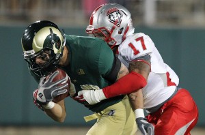 Colorado State Rams tight end Crockett Gillmore (10) is tackled by New Mexico Lobos cornerback Freddy Young (17). Credit: Troy Babbitt-US PRESSWIRE