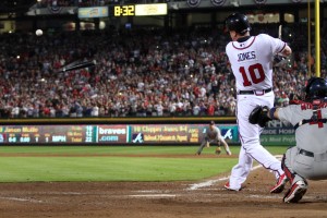 Atlanta Braves third baseman Chipper Jones (10) hits a broken-bat single in the final at-bat of his major league career during the ninth inning of the 2012 National League wild card playoff game at Turner Field. Mandatory Credit: Daniel Shirey-USA TODAY Sports