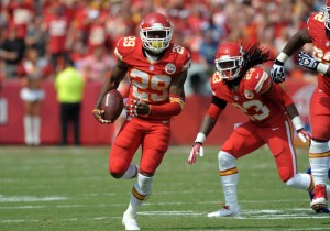 Kansas City Chiefs strong safety Eric Berry (29) runs for yardage after recovering a fumble from Dallas Cowboys running back Lance Dunbar (25) (not pictured) during the second half at Arrowhead Stadium. The Chiefs won 17-16. Mandatory Credit: Denny Medley-USA TODAY Sports
