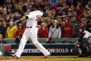 Boston Red Sox designated hitter David Ortiz (34) hits a grand slam during the eighth inning in game two of the American League Championship Series baseball game against the Detroit Tigers at Fenway Park. Mandatory Credit: Greg M. Cooper-USA TODAY Sports