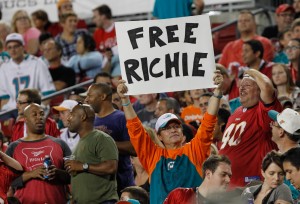 Miami Dolphins fan hold up a sign for Miami Dolphins guard Richie Incognito (68) (not pictured) sign that says "Free Richie" during the second half against the Tampa Bay Buccaneers at Raymond James Stadium. Mandatory Credit: Kim Klement-USA TODAY Sports