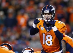 Denver Broncos quarterback Peyton Manning (18) in the first quarter against the Kansas City Chiefs at Sports Authority Field at Mile High. Mandatory Credit: Isaiah J. Downing-USA TODAY Sports